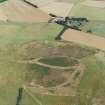 Oblique aerial showing tower house at Dunnideer, Aberdeenshire 