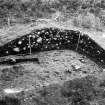 Excavation photographs: Scheduled area (site 1156) excavation; general shots, longhouse (site 966) general shots, clearance cairn (1004) section, section of cairn during sampling.