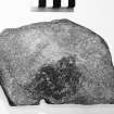 Post ex photograph : part of quern stone?