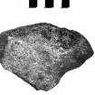 Post ex photograph : part of quern stone.