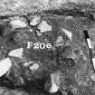 Excavation photograph. Area 8. Feature 206 from west.