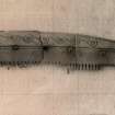 Inscribed bone comb.