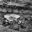 Excavation photograph showing working area looking NW - hearth, stake holes and outer face of dun wall at area KL-8-9
Duplicate photographic print available in MS/1179/1