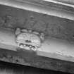 Detail of grotesque head shouldering lintel (dated 1740) above doorway, 3 High Shore, Banff.