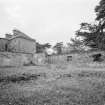 View of remains of demolished wing's west wall, Broxmouth Park, from north east.