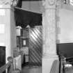 Interior view of Trinity Free Church, Irvine, showing detail of stone column and capital.