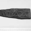 E29  Piece of carved wood.