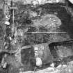 Excavation photograph : Area 1, showing charcoal 133.