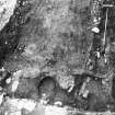 Excavation photograph : Area 1, showing charcoal 133.