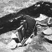 Excavation photograph : Seated burial, Enclosure I.