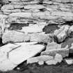 Excavation photograph : Enclosure by broch wall in north.