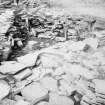 Excavation photograph : Behind fort wall, east of entrance.