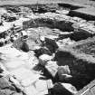 Excavation photograph : external rampart wall and its associated cell, with entrance, cross passage on left.