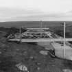 Shuttering around tomb prior to reinforcing rods and cement