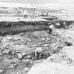 Upper Suisgill excavation photograph
Area I / IA / II - roundhouse during excavation, looking S.