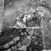 Trench 1,area A, coursed masonry abutting broch wall,after cleaning from south