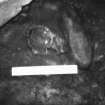 Excavation photograph -  Pot base in situ in guard cell, from W.
Photographic copy of polaroid print. Copied 1995.