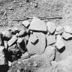 Excavation photograph : F24 S. paving after further excavation.