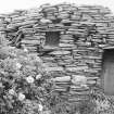 Survey photograph : site 35c - earlier domestic unit, with lean-to added to east.  Drystone construction.