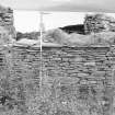 Survey photograph : site 35d - front elevation of primary domestic unit of drystone construction.