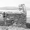 Survey photograph : site 51c - southern end of front elevation of agricultural building of drystone construction.