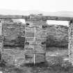Survey photograph : site 27b - outside of Room I of earlier domestic/byre unit, showing double entrance.
