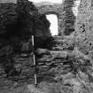 Excavation photograph - Detail of blocking 105 in doorway to NW stairs