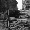 Excavation photograph - Detail of blocking 105 in doorway to NW stairs