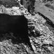 Excavation photograph - Surviving entrance levels to main cellar