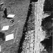 Excavation photograph - Paving surviving to S of tower