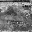 Excavation photograph : N end of E range after removal of all modern deposits and disturbances, from E.