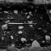 Excavation photograph : Extension to trench B, 5cm spit below ploughsoil 047 944; from west.