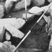 excavation photograph - looking down in the area of paving removed in the SW quadrant between the outer continguous walling and the wall of outer channel