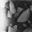 Excavation photograph - XLII NE corner of circular structure immediately to right of threshold stone in course of excavation