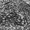 Excavation photograph : cairn from above - south-west sector, cleaned to structural level.