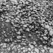 Excavation photograph : cairn from above - south-west sector, cleaned to structural level.