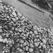 Excavation photograph : cairn from above - cleaned to structure level, in north-east quadrant.