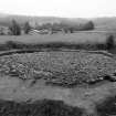 Excavation photograph : cairn cleaned to cobbled surface from north.