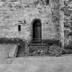 Excavation photograph : sump outside door into east wing.