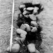 Excavation photograph.  Feature 1.  N side of entrance from N.