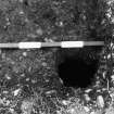 Excavation photograph : area C - posthole on western side of ditch terminal, from west.