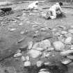 Excavation photograph : area 2, revetment being exposed, from south-east.