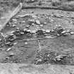 Excavation photograph : area 4 - Hut J, from W.
(inaccurate description in photographic register)