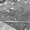 Excavation photograph : area 4 - burnt post holes in Hut J? from SW.
(inaccurate description in photographic register)