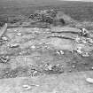 Excavation photograph : area 4 - Hut J, from W.
(inaccurate direction in photographic register)