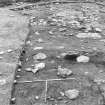 Excavation photograph : area 4 - Hut K, from S, in foreground.