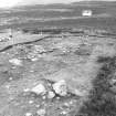 Excavation photograph : area 4 - Hut J, from SE.
