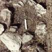 Excavation photograph : area 2 - f2008, ?stake void in wall 2016, from above.