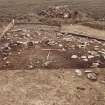 Excavation photograph : area 4 - Hut J, from west.