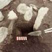 Excavation photograph: area 2 - f2068, posthole, Hut H, half section, from S.